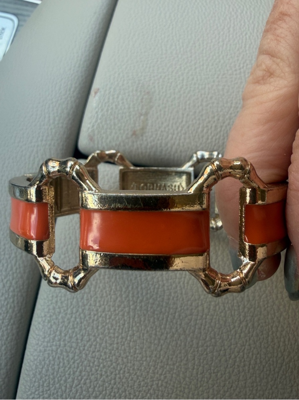 Gold-Tone Bracelet with Vibrant Orange Enamel Accents